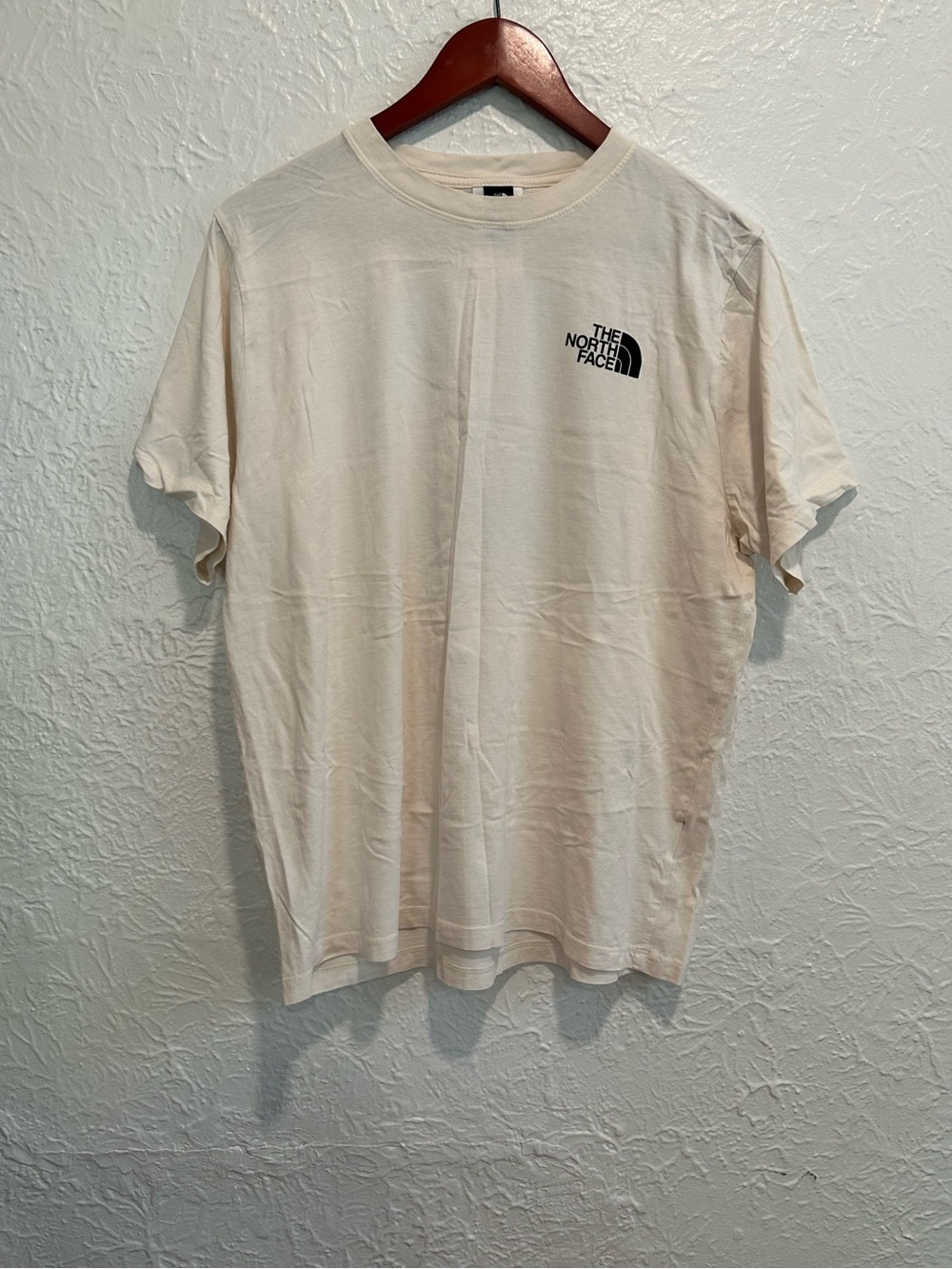 The North Face Women's Short Sleeve Tee in Cream with Black Logo